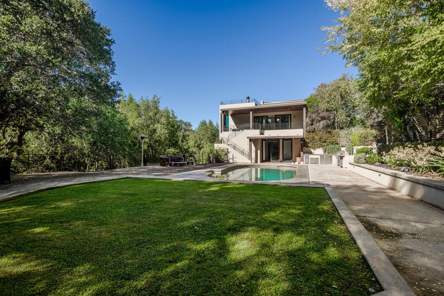 2510 Skyfarm Drive Hillsborough, CA 94010 - Photo 56 of 66 a front view of a house with a yard