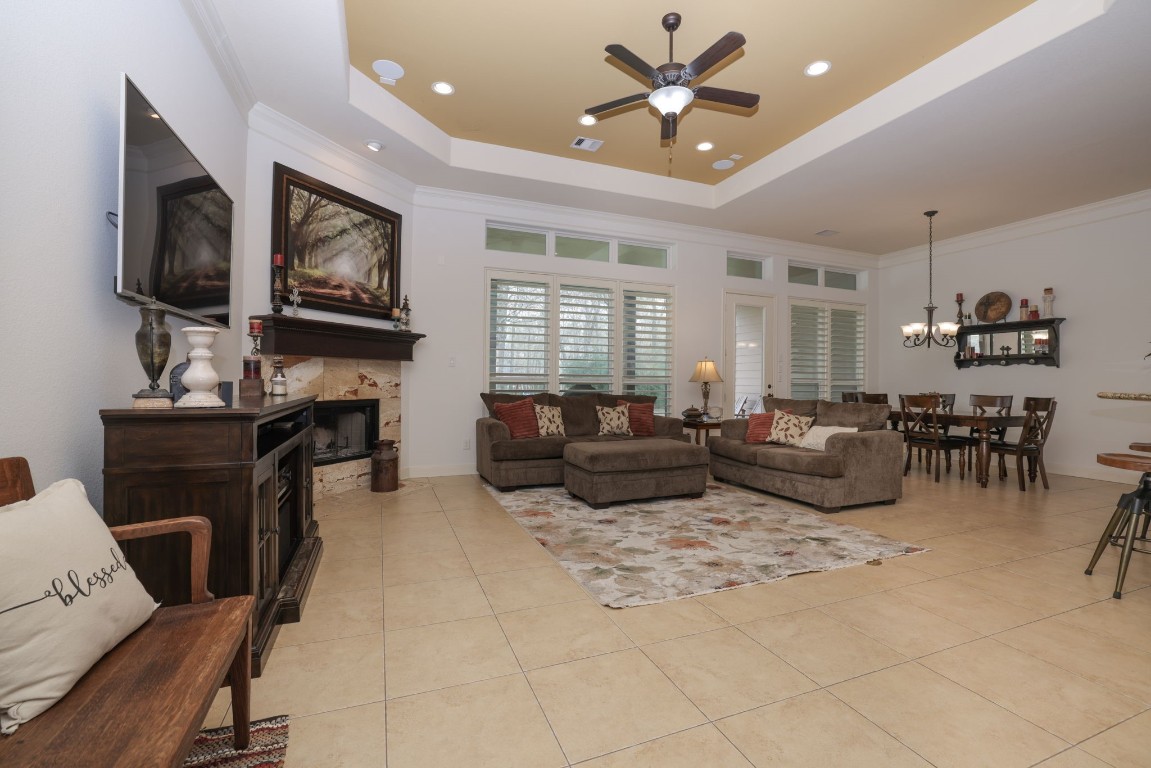 1547 Ruby Drive Willis, TX 77378 - Photo 12 of 45 a living room with furniture a flat screen tv and a window
