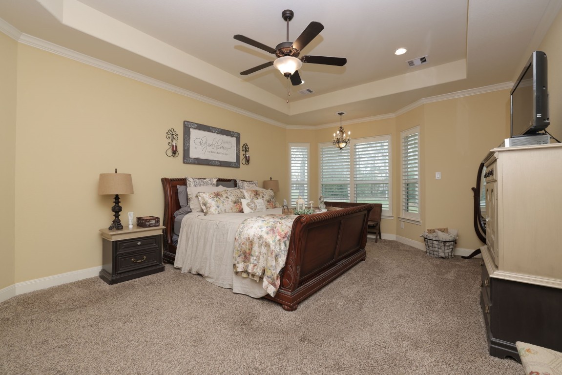 1547 Ruby Drive Willis, TX 77378 - Photo 21 of 45 a bed room with a bed and a window