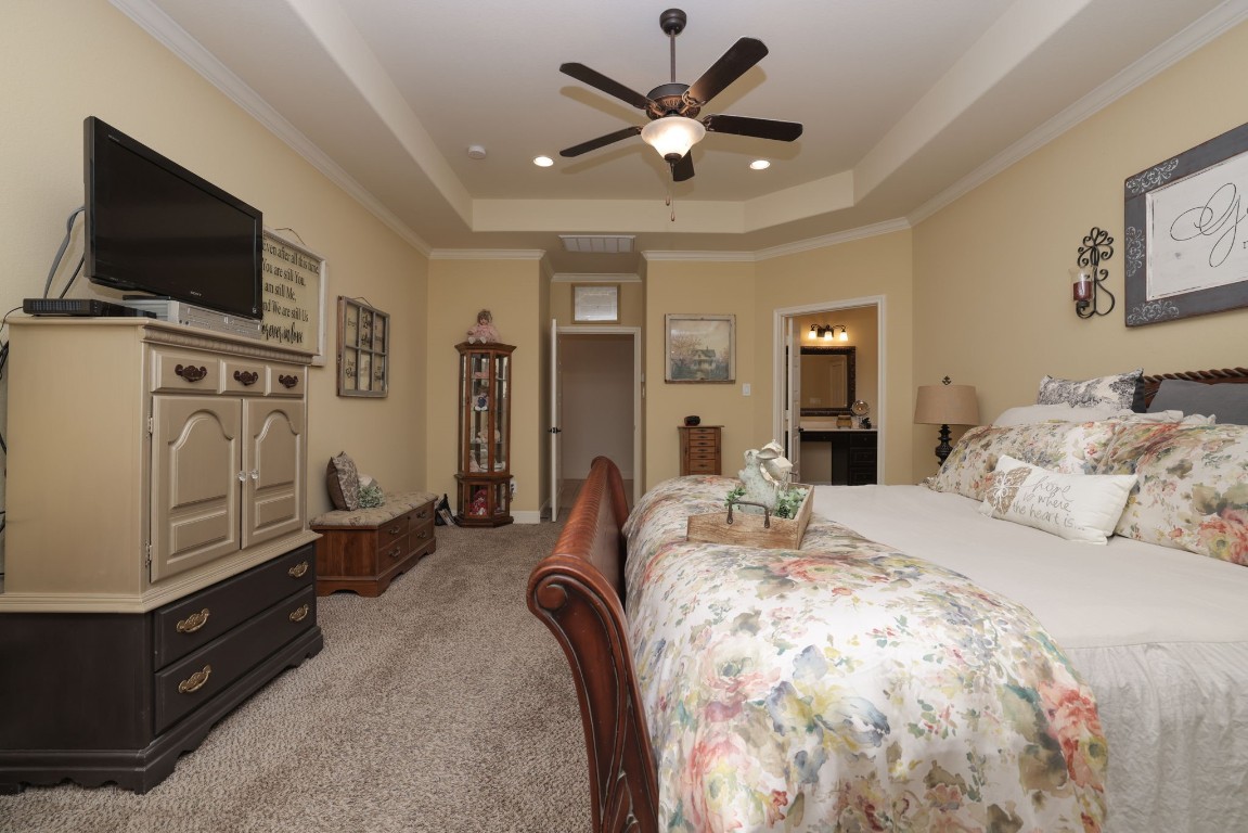1547 Ruby Drive Willis, TX 77378 - Photo 23 of 45 a bed room with a bed and a television