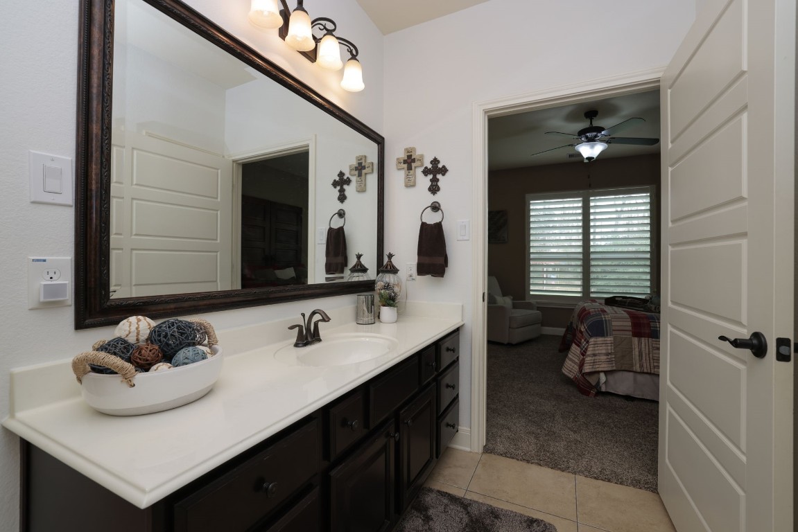 1547 Ruby Drive Willis, TX 77378 - Photo 33 of 45 a bathroom with a sink double vanity and a mirror