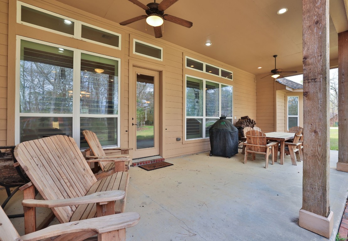 1547 Ruby Drive Willis, TX 77378 - Photo 37 of 45 a living room with furniture and a large window