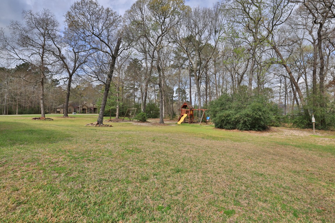 1547 Ruby Drive Willis, TX 77378 - Photo 39 of 45 a view of a trees in a park