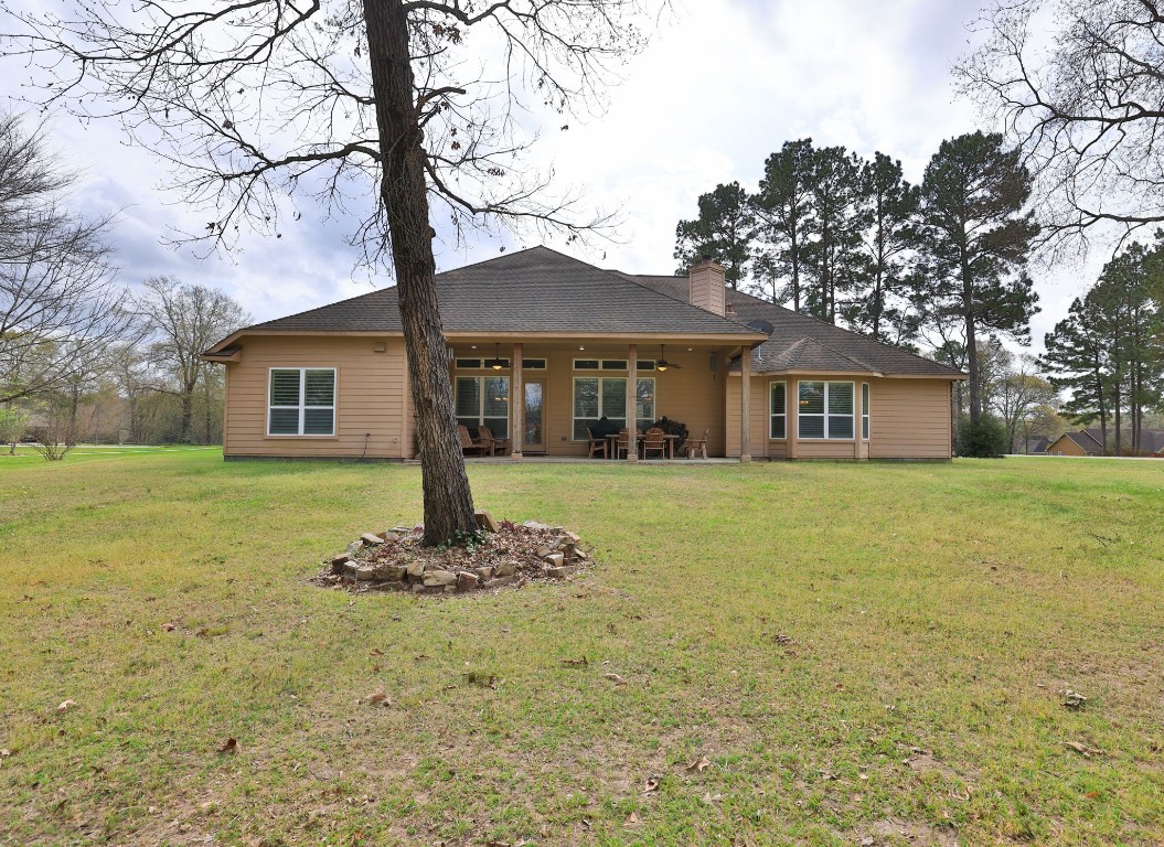 1547 Ruby Drive Willis, TX 77378 - Photo 41 of 45 a front view of house with yard and green space