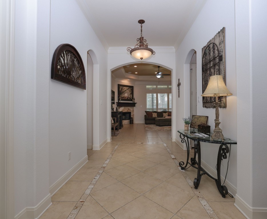 1547 Ruby Drive Willis, TX 77378 - Photo 6 of 45 a view of a livingroom with a furniture and a chandelier