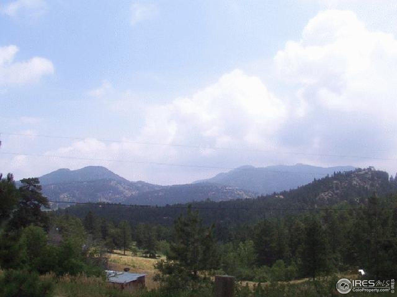 11716 West Ranch Elsie Road Golden, CO 80403 - Photo 2 of 2 a view of a city with mountains in the background