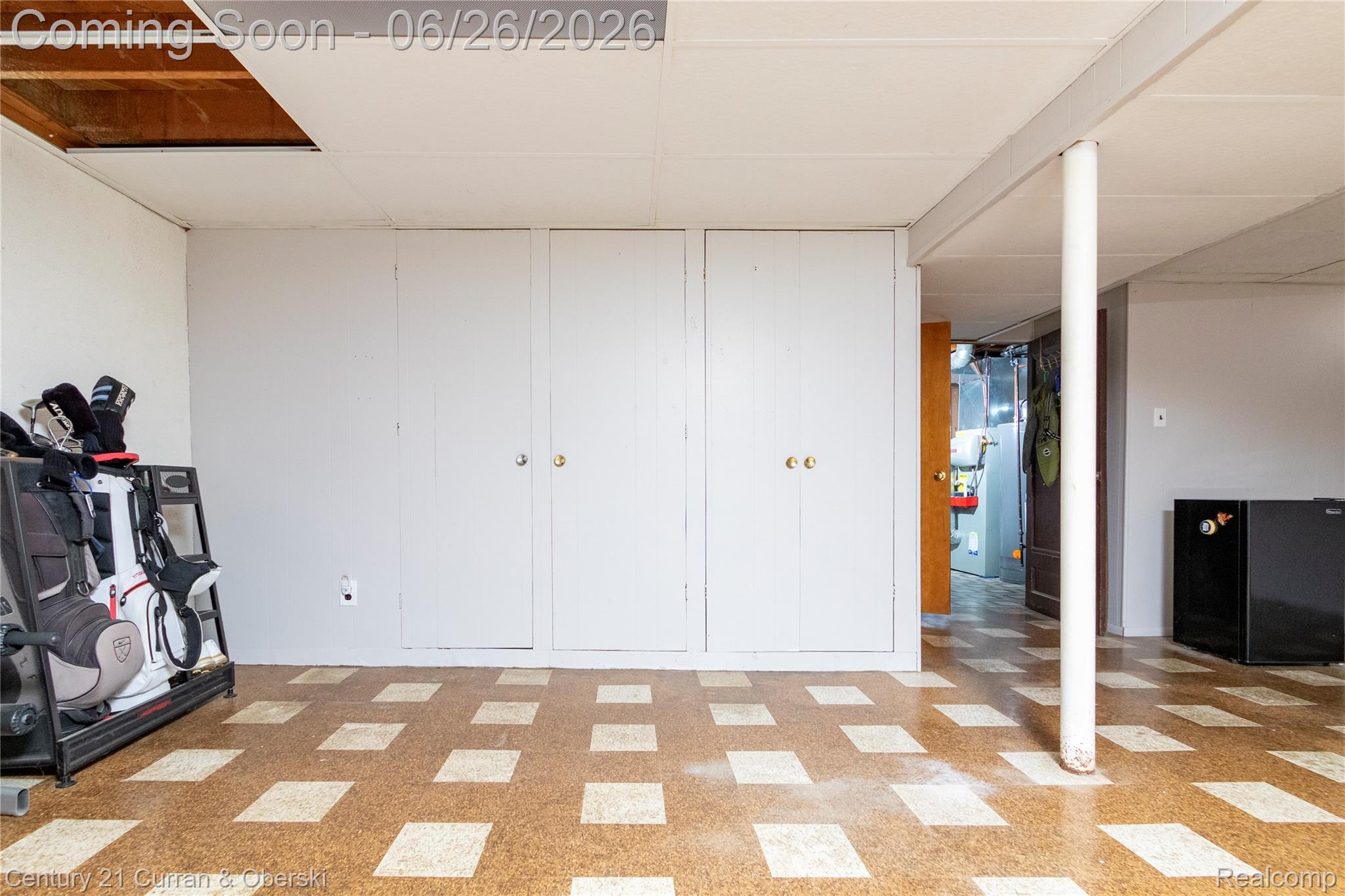 3220 Alice Street Dearborn, MI 48124 - Photo 26 of 39 Finished space featuring white walls, a drop ceiling, and a patterned floor
