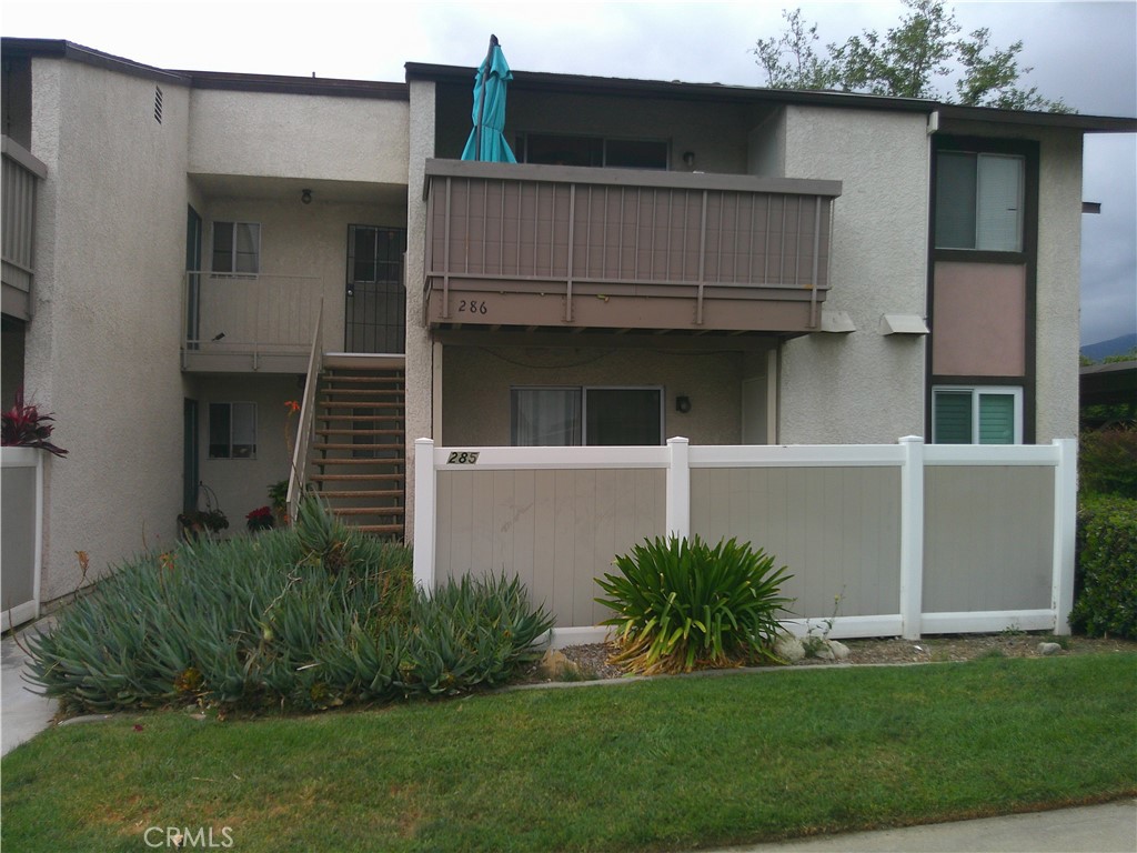 8990 19th Street, Unit 286 Rancho Cucamonga, CA 91701 - Photo 1 of 10 a house view with a garden space