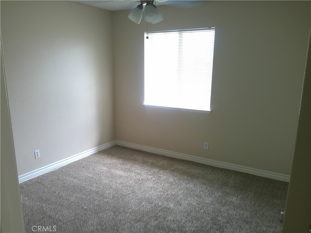 8990 19th Street, Unit 286 Rancho Cucamonga, CA 91701 - Photo 6 of 10 an empty room with a window