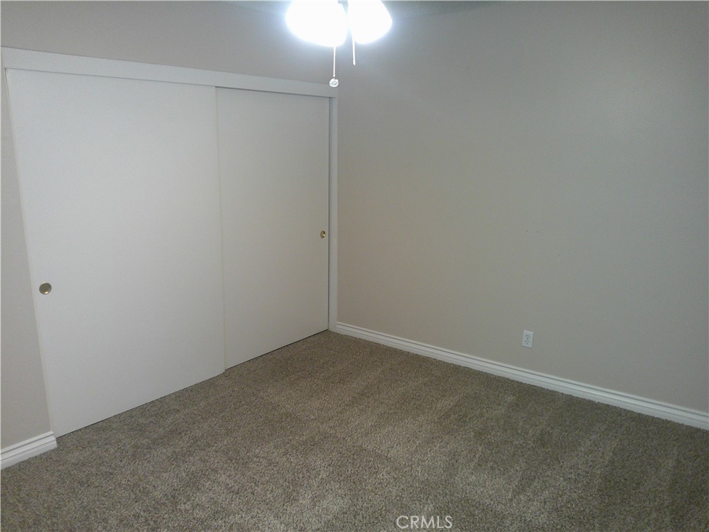 8990 19th Street, Unit 286 Rancho Cucamonga, CA 91701 - Photo 8 of 10 a view of an empty room
