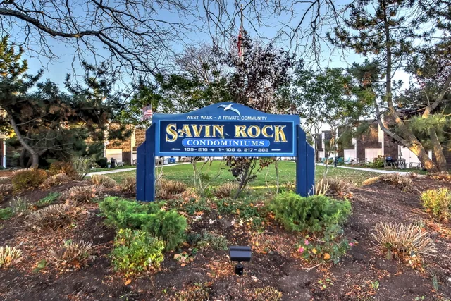 a sign on the side of the road