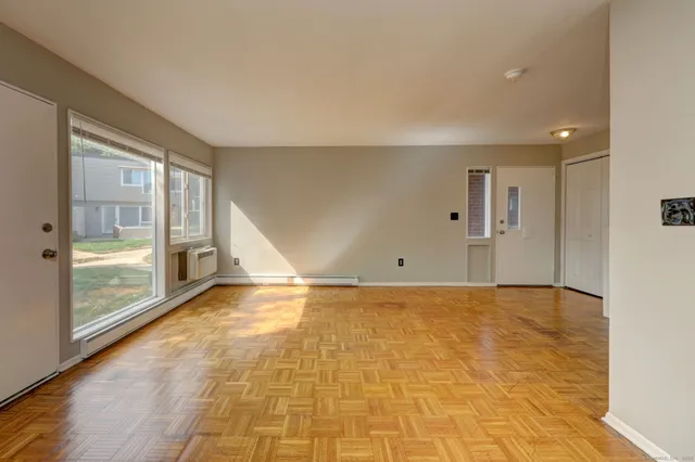 a view of a kitchen from the hallway