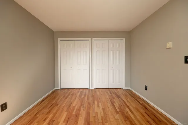 a view of a livingroom with wooden floor