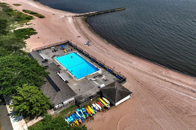 an aerial view of house with yard