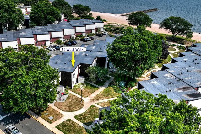 a view of a street with sitting area