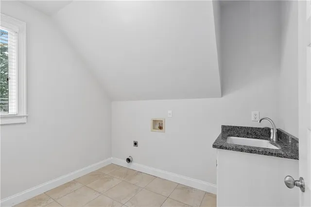 a bathroom with a sink and vanity