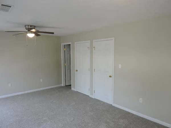 a view of small space with racks on the wall