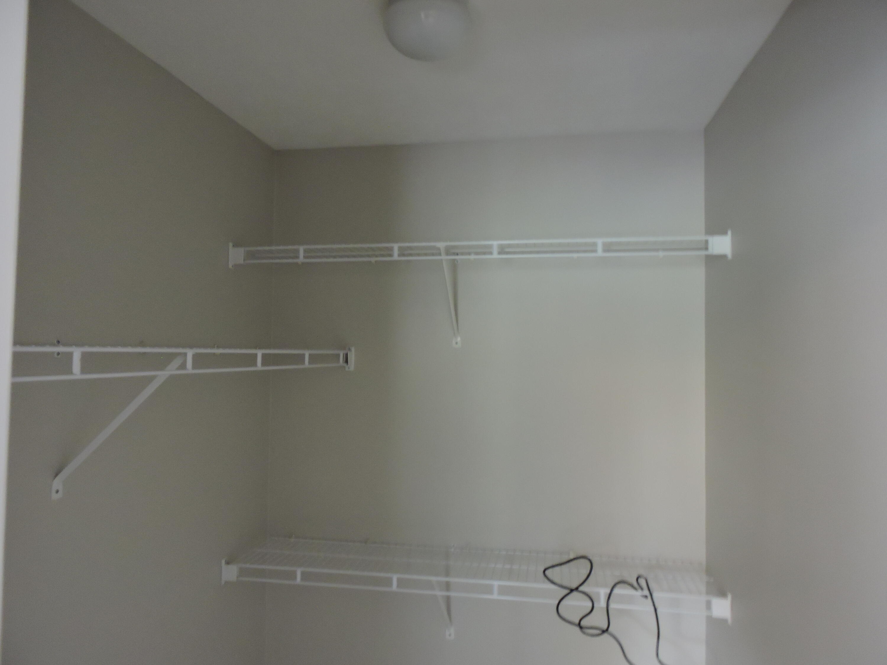 207 Swaying Pine Court Crestview, FL 32539 - Photo 13 of 15 a view of small space with racks on the wall