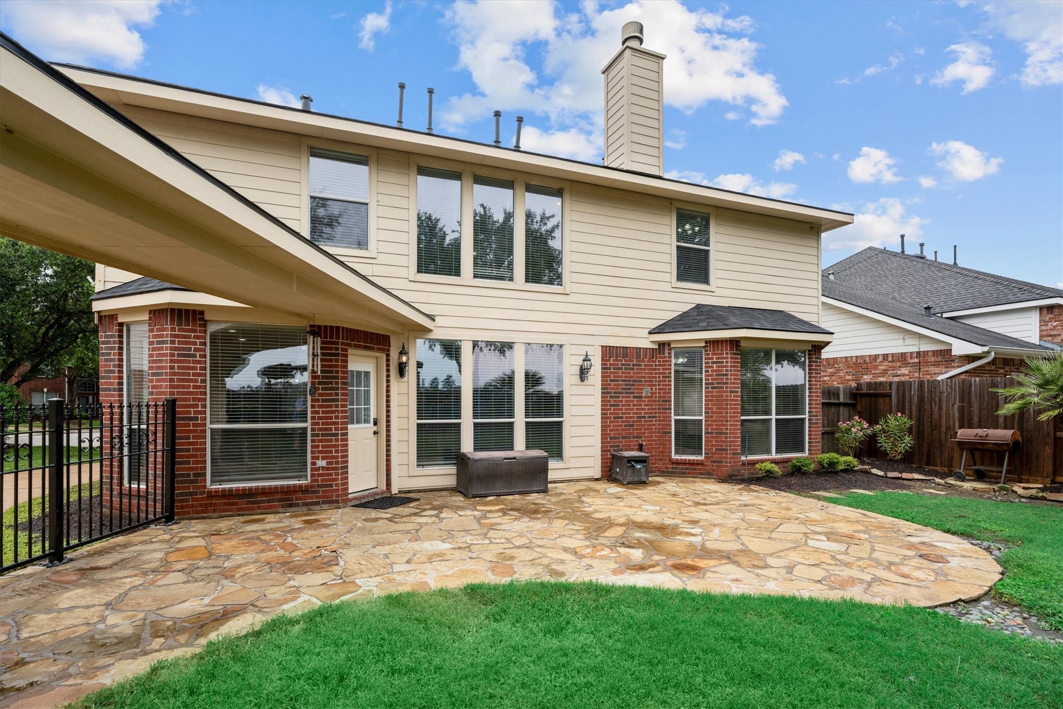 6323 Stone Trail Lane Spring, TX 77379 - Photo 27 of 43 a front view of a house with a yard