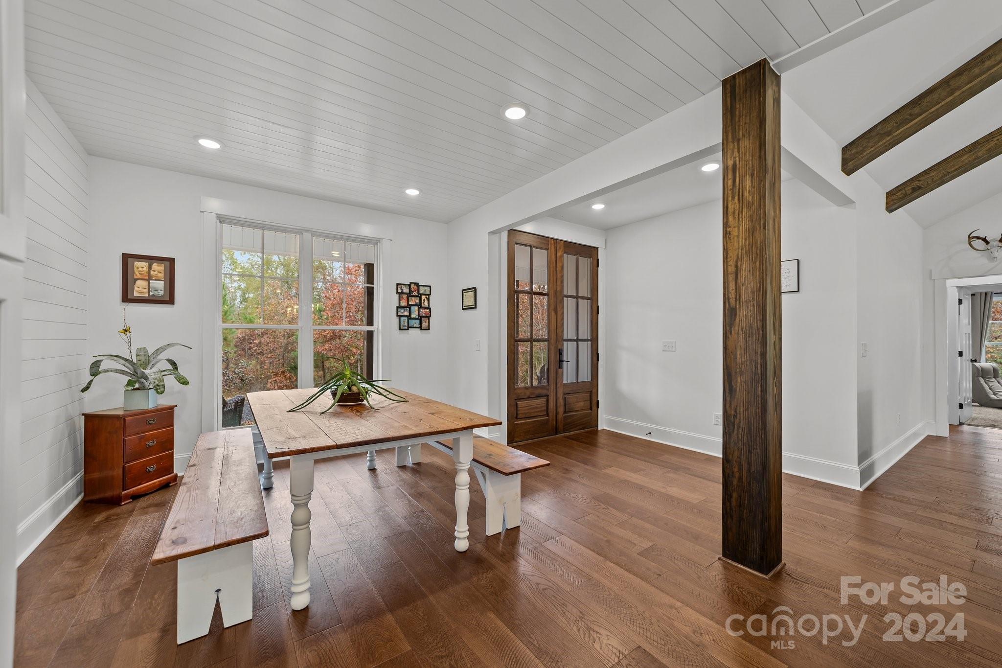 450 Bringle Ferry Road Denton, NC 27239 - Photo 14 of 48 a view of a dining room with furniture window and wooden floor