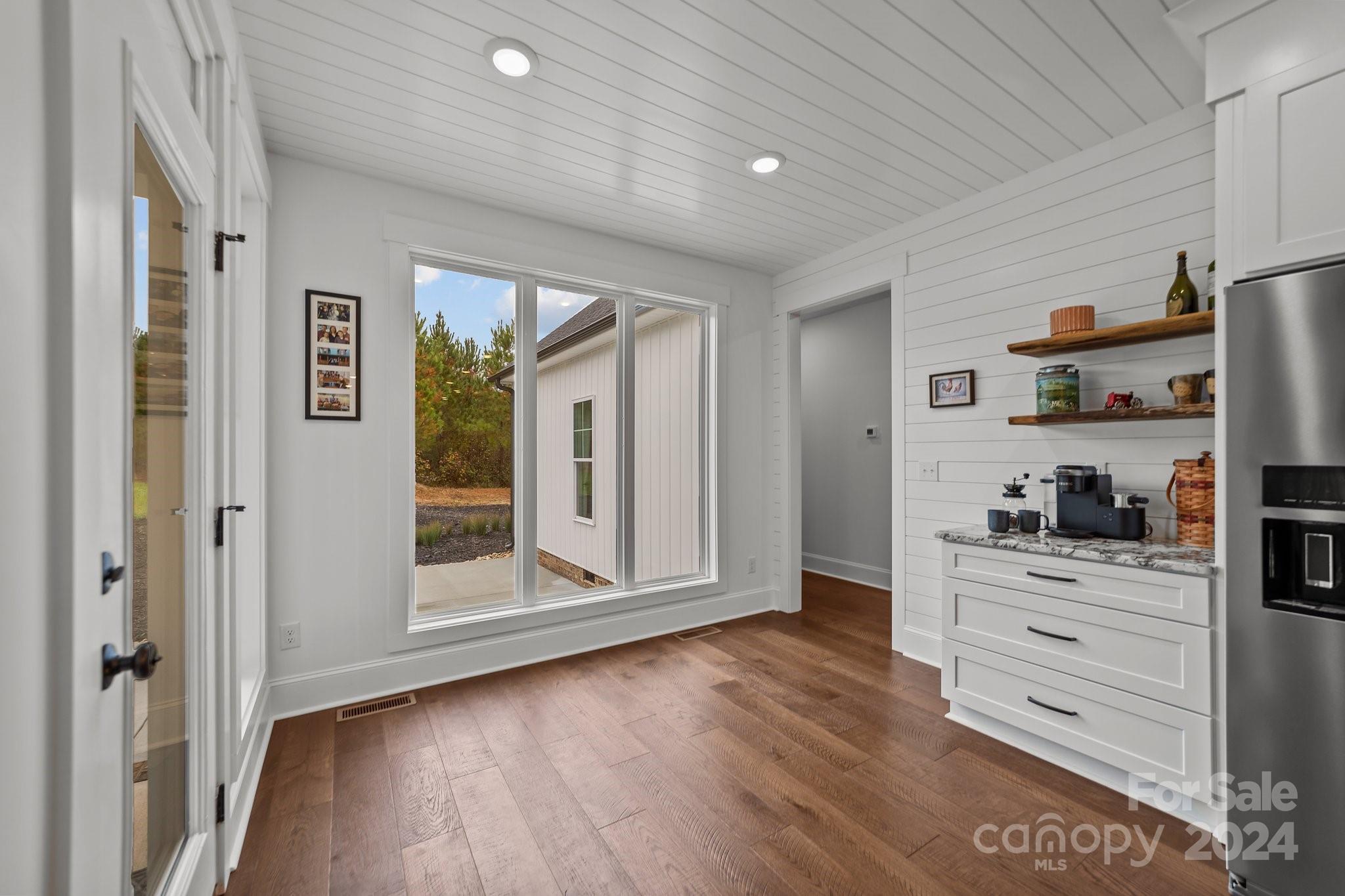 450 Bringle Ferry Road Denton, NC 27239 - Photo 26 of 48 a view of a kitchen with wooden floor