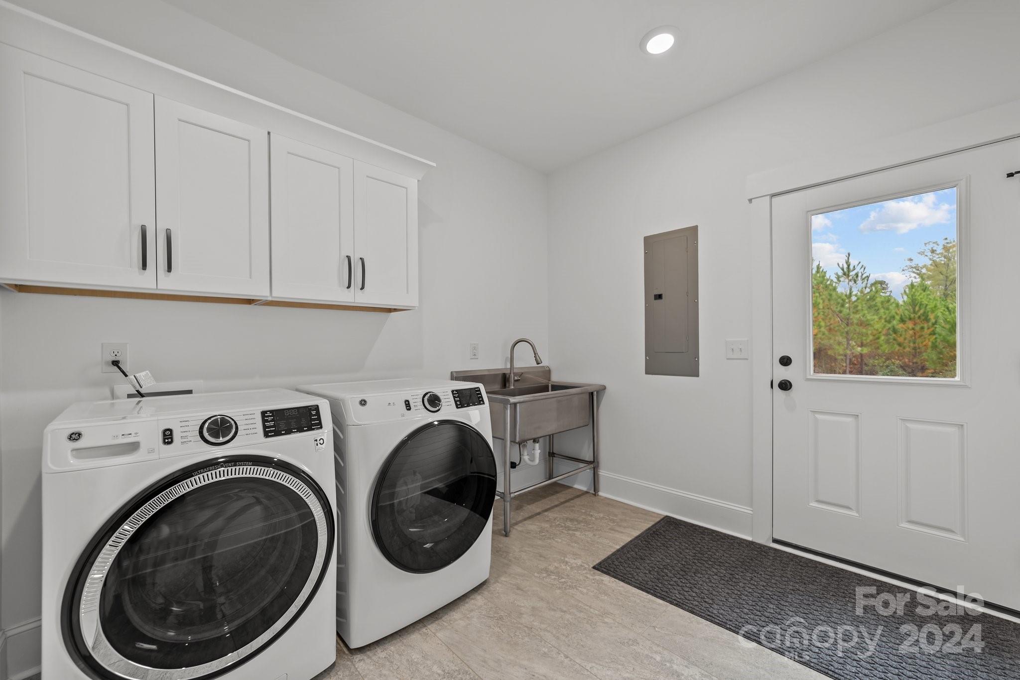 450 Bringle Ferry Road Denton, NC 27239 - Photo 35 of 48 a view of entryway with washer and dryer