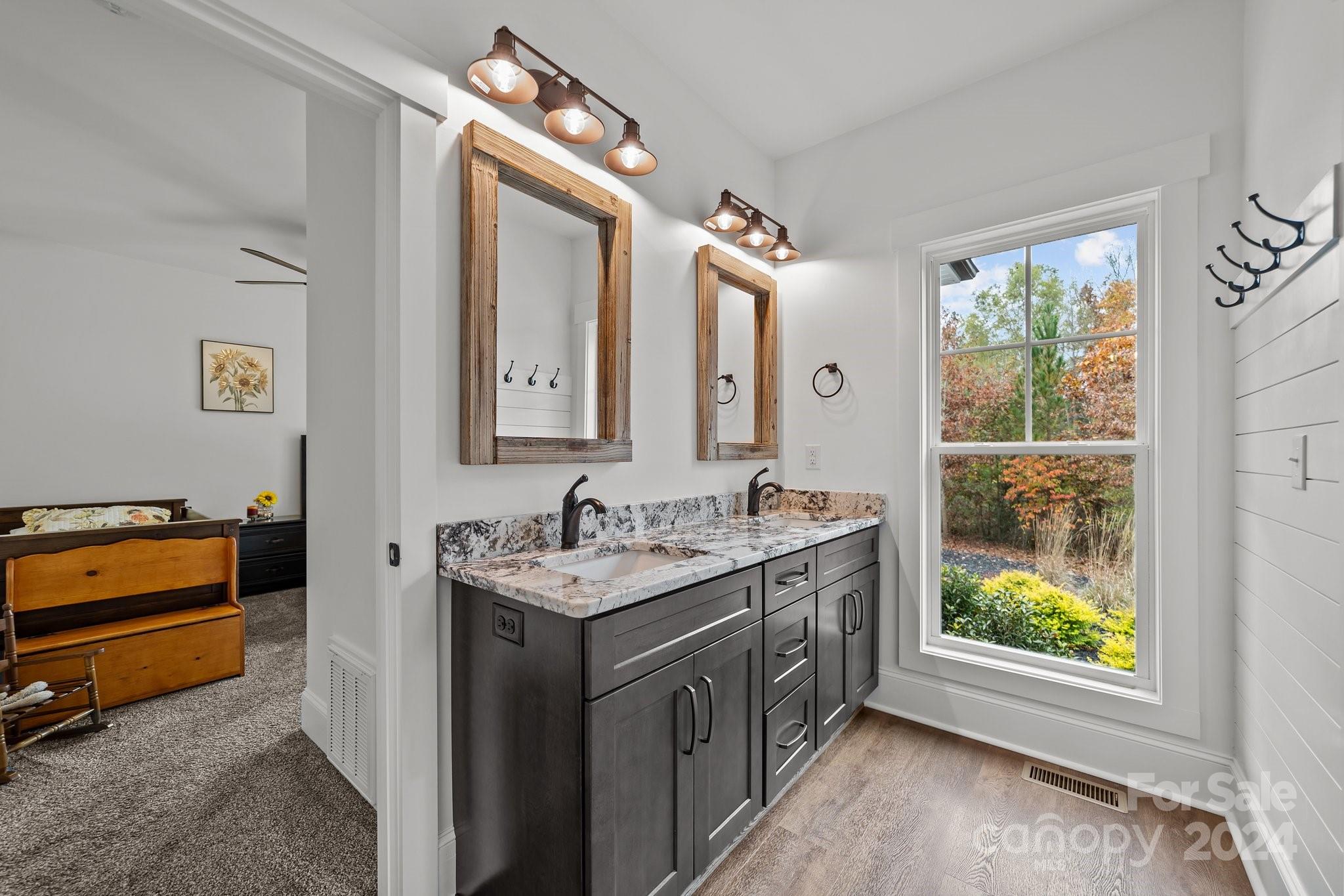 450 Bringle Ferry Road Denton, NC 27239 - Photo 38 of 48 a bathroom with a sink and a mirror
