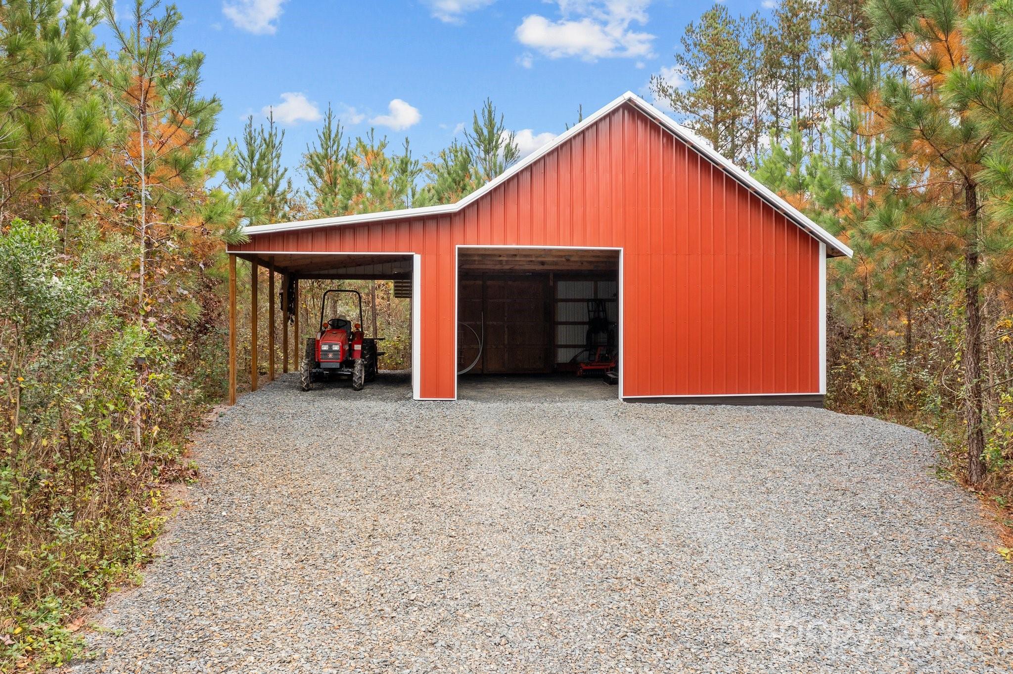 450 Bringle Ferry Road Denton, NC 27239 - Photo 47 of 48 a view of a house with a yard and garage
