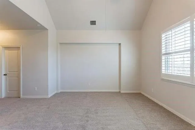 an empty room with a window