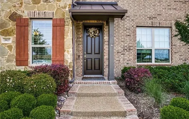 a front view of a house with a porch