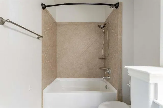 front view of a brick house with a small space