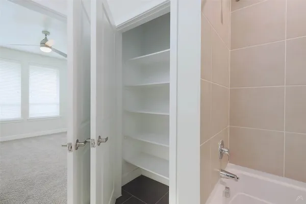 a view of a walk in closet