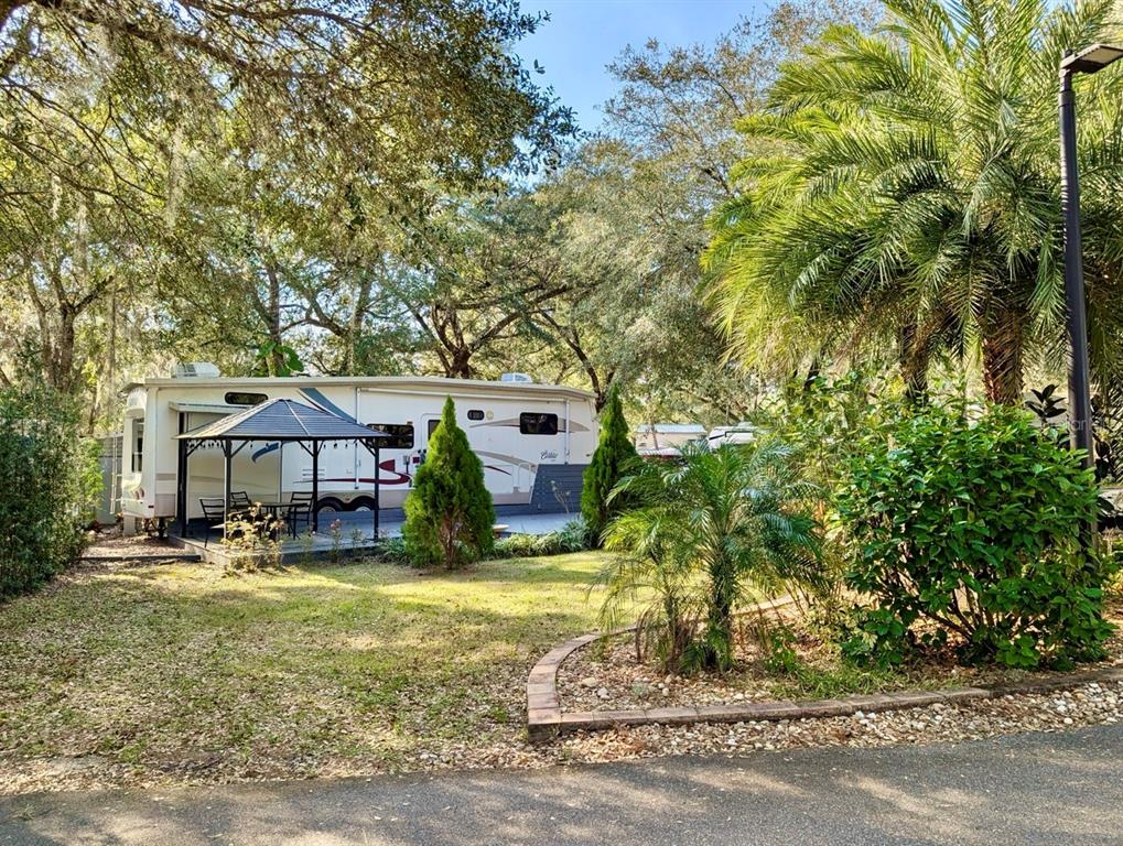 14131 Northeast 253rd Ave Road Salt Springs, FL 32134 - Photo 23 of 26 a view of a yard in front of house