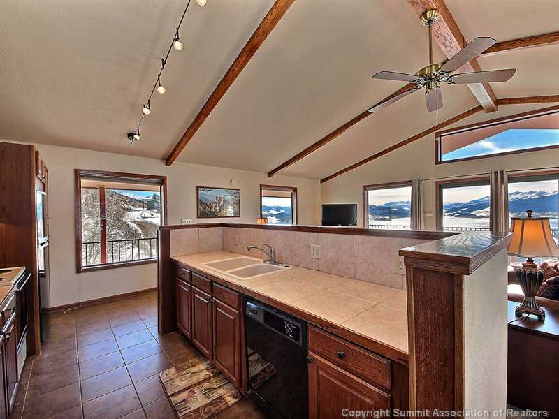 48 AB Road Silverthorne, CO 80498 - Photo 14 of 25 Kitchen. Kitchen area with Vaulted Ceilings that open up to the living area.