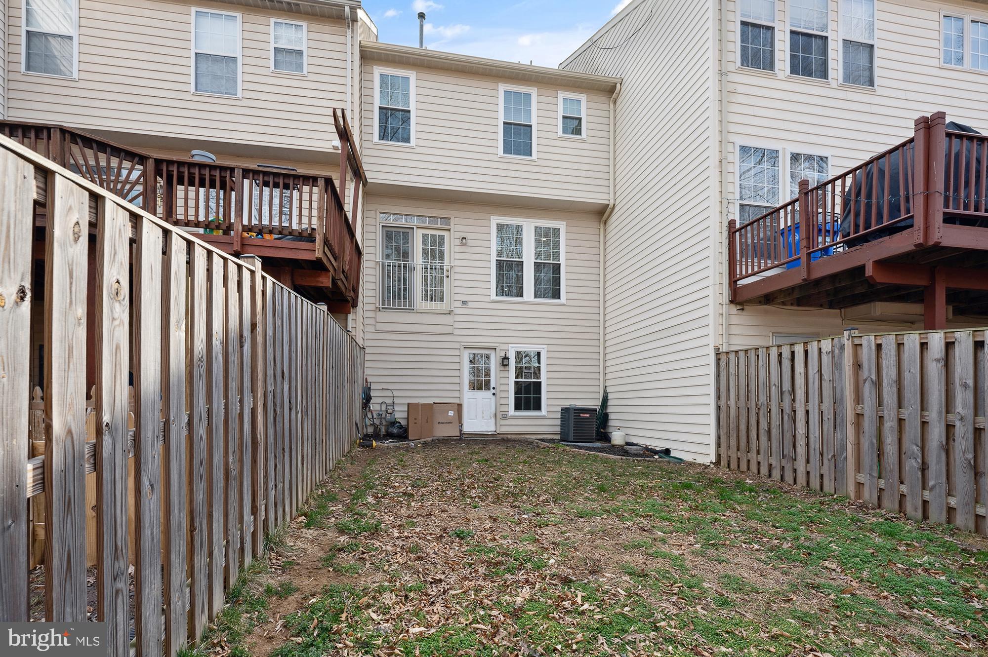 3663 Singleton Terrace Frederick, MD 21704 - Photo 29 of 34 a view of a house with wooden deck