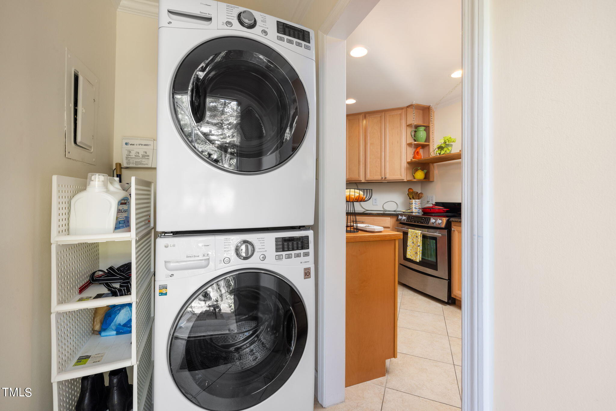 3409 Lewis Farm Road Raleigh, NC 27607 - Photo 20 of 31 a view of a kitchen with washer and dryer