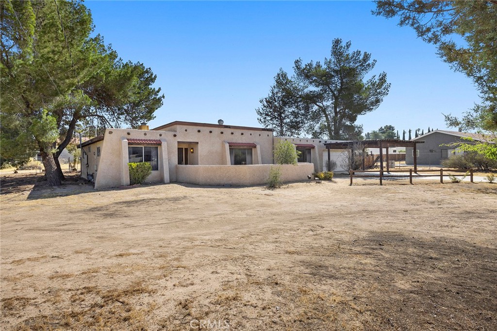 19308 Yanan Road Apple Valley, CA 92307 - Photo 1 of 1 a view of a house with a outdoor space