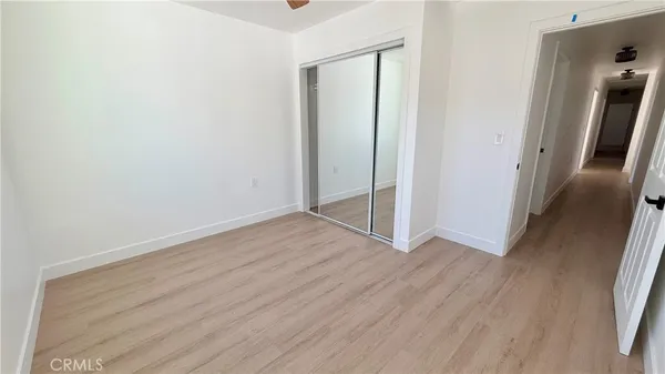 a bathroom with a toilet and shower