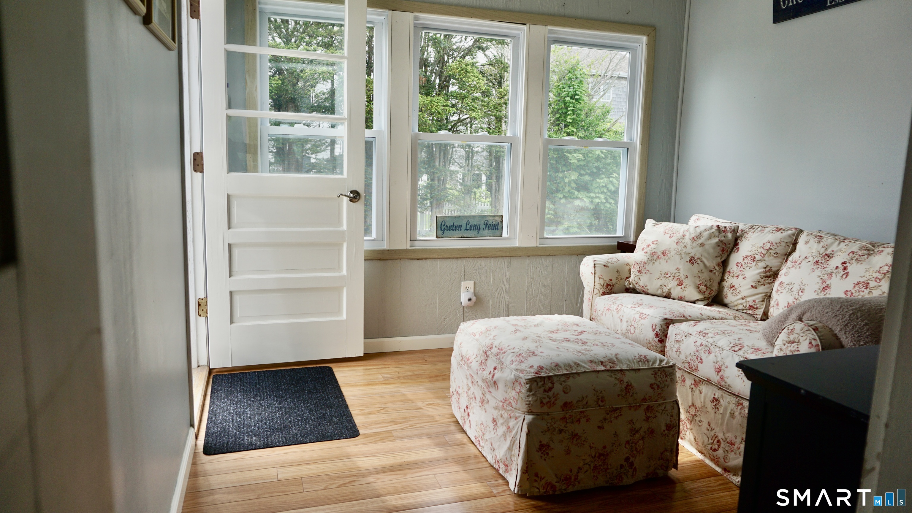 13 Pacific Street Groton, CT 06340 - Photo 17 of 31 a living room with furniture and a window