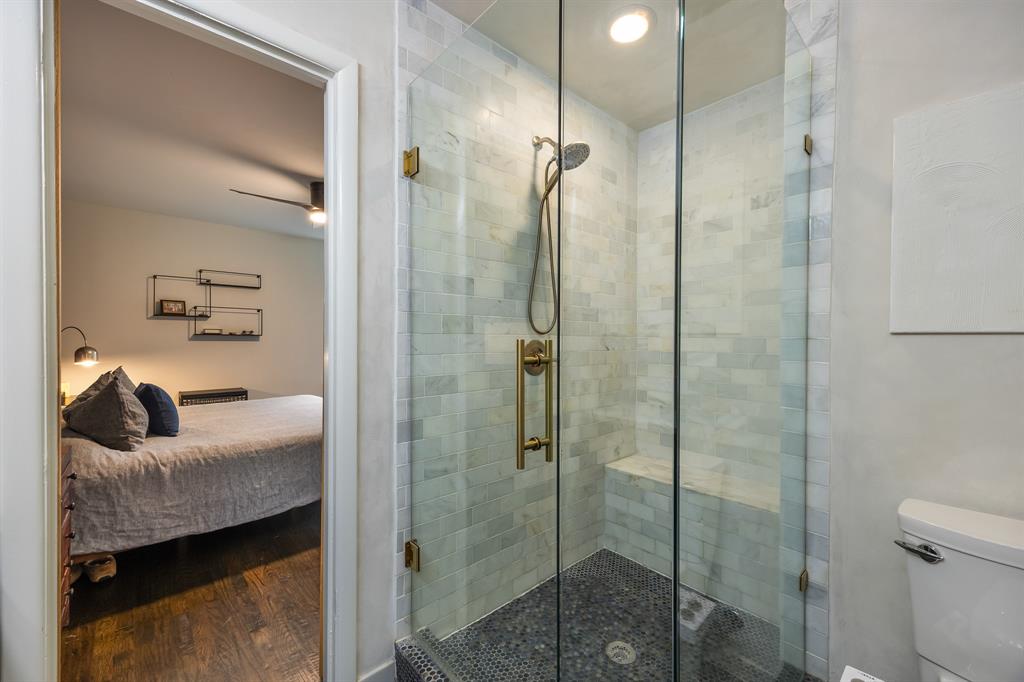 11718 Rogue Way Dallas, TX 75218 - Photo 21 of 35 a bathroom with a shower