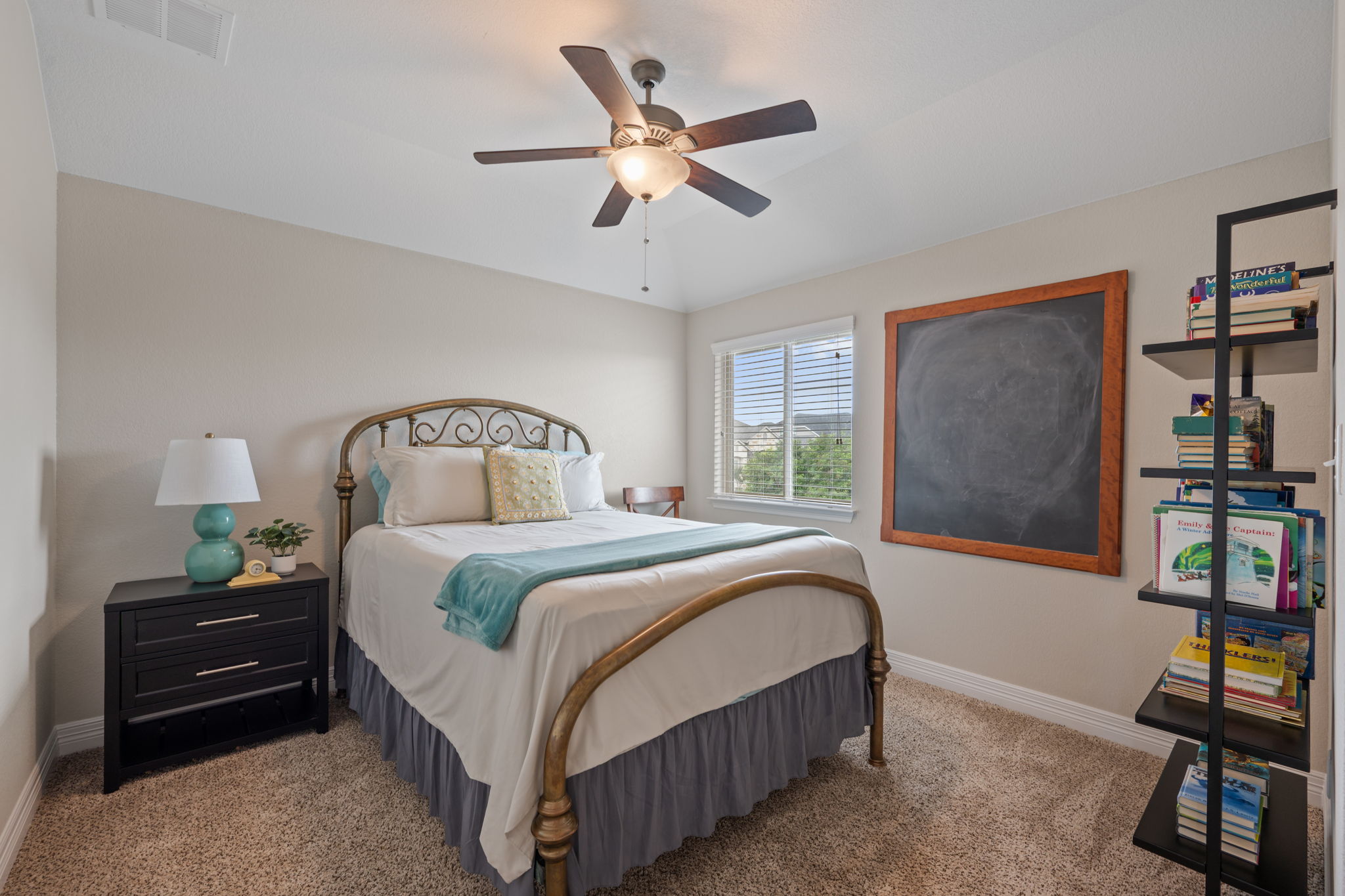 408 Bell Boot Pass Georgetown, TX 78626 - Photo 28 of 40 Bedroom with light-colored walls and carpeted flooring, featuring a ceiling fan with integrated lighting