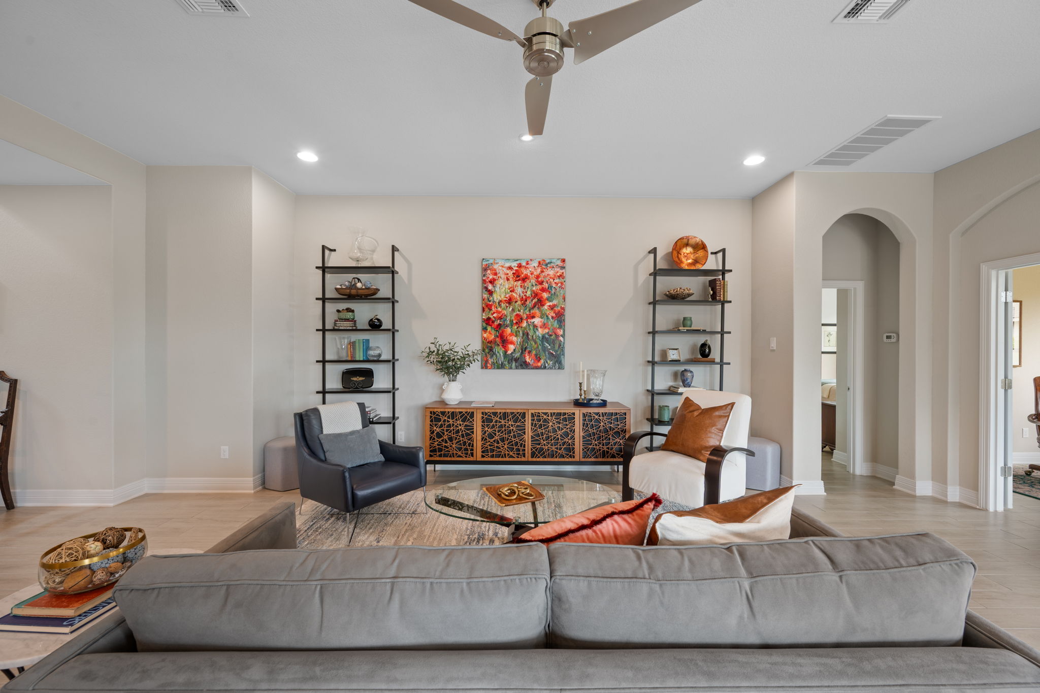 408 Bell Boot Pass Georgetown, TX 78626 - Photo 7 of 40 Spacious living area featuring light-toned walls, wood-finish flooring, and recessed lighting