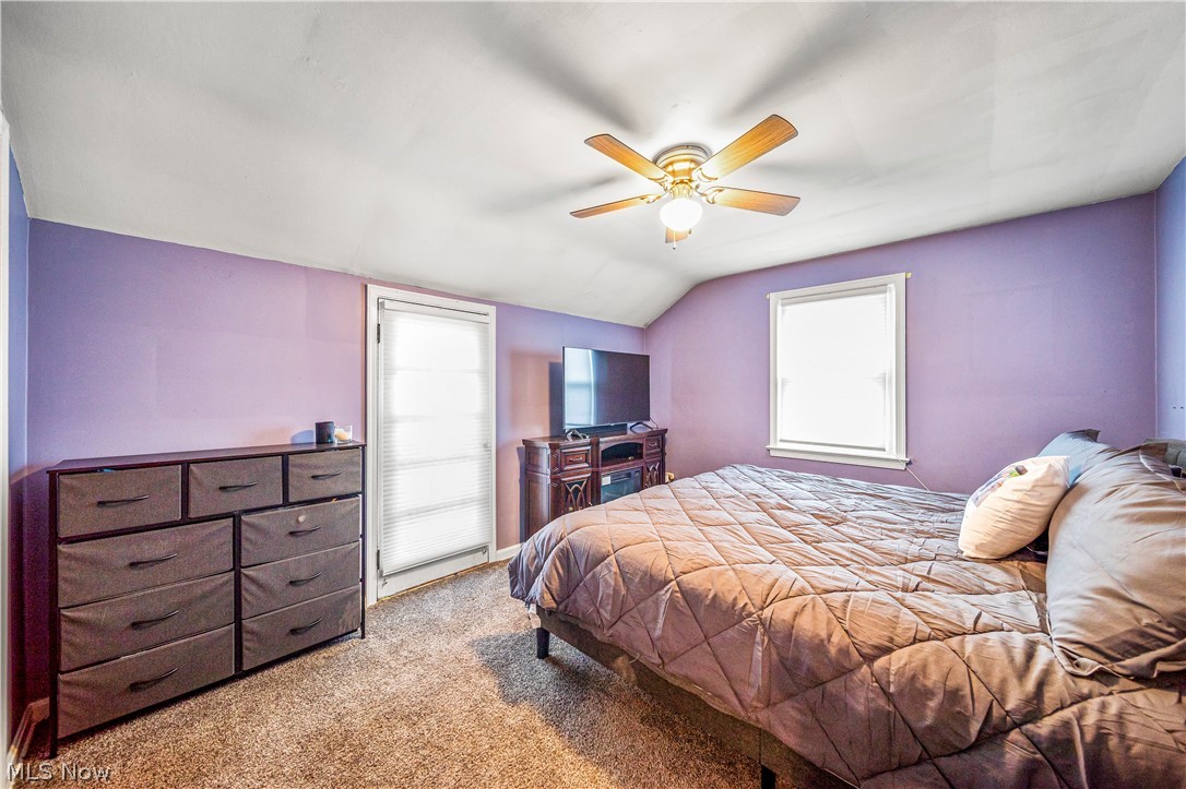1588 Biltmore Road Cleveland, OH 44124 - Photo 6 of 43 Bedroom with vaulted ceiling, light colored carpet, and ceiling fan