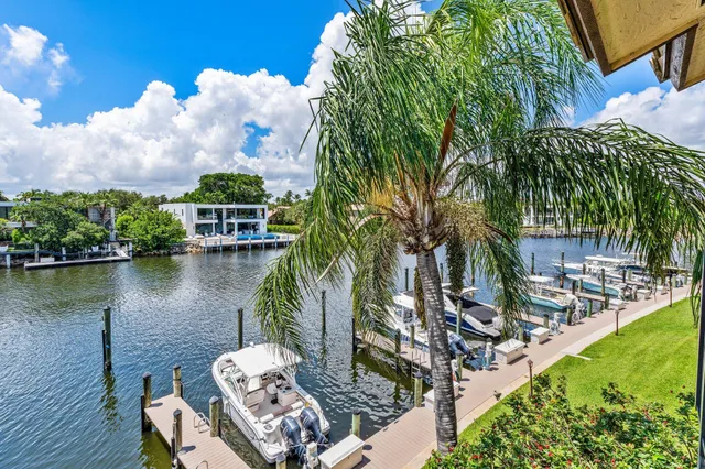 a view of a lake with sitting area