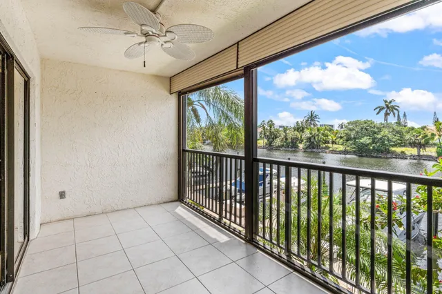 a view of a room with a large window