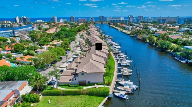 a front view of a house with yard