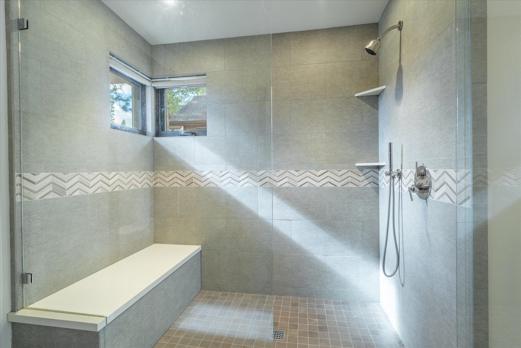 11460 Ghirard Road Truckee, CA 96161 - Photo 12 of 21 a bathroom with a granite countertop sink a toilet and shower