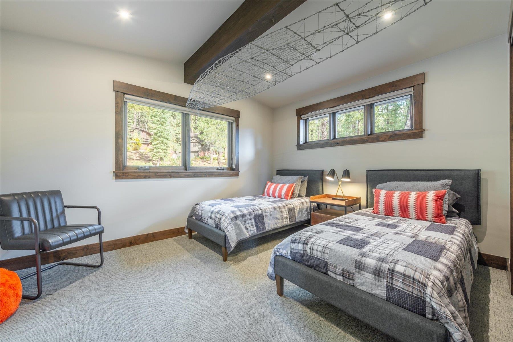 11460 Ghirard Road Truckee, CA 96161 - Photo 13 of 21 a bedroom with two beds and a window