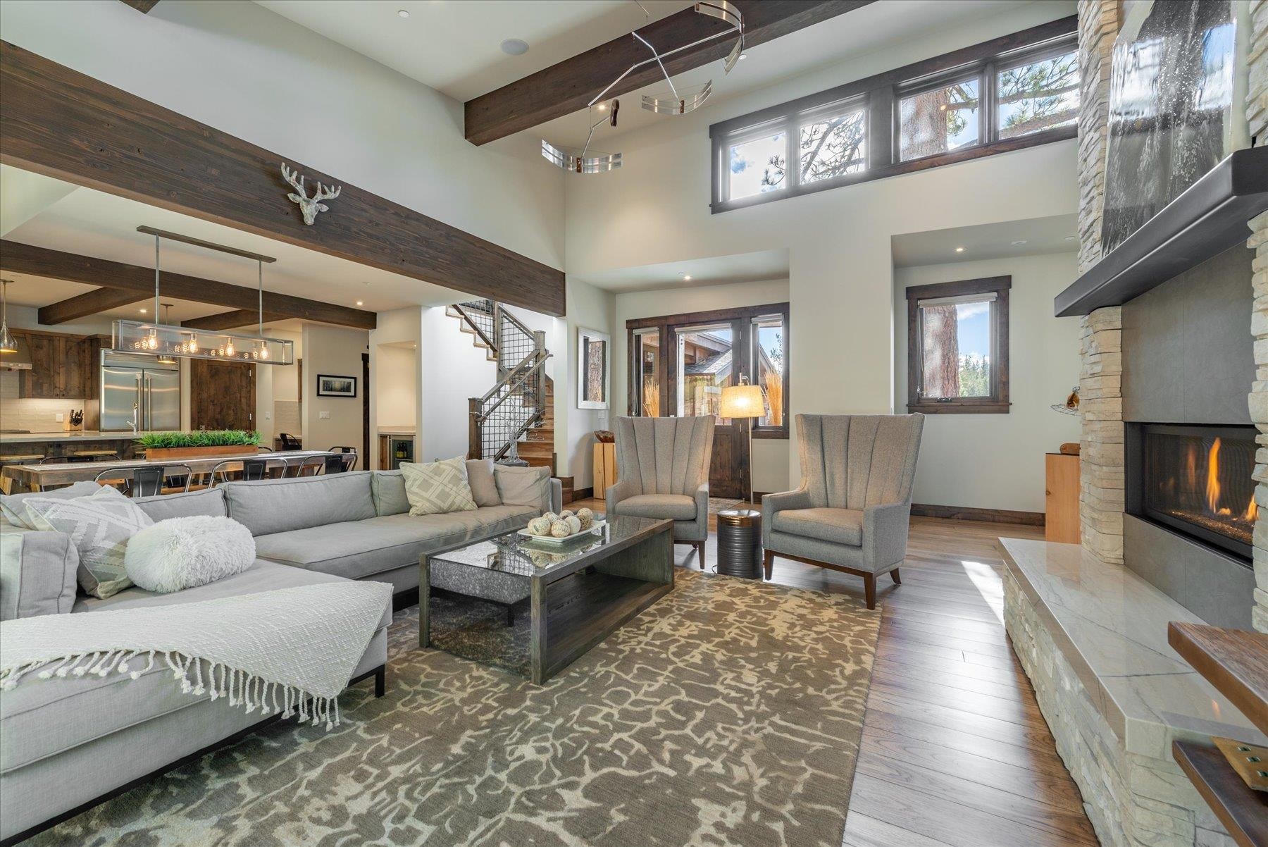 11460 Ghirard Road Truckee, CA 96161 - Photo 3 of 21 a living room with furniture and a fireplace