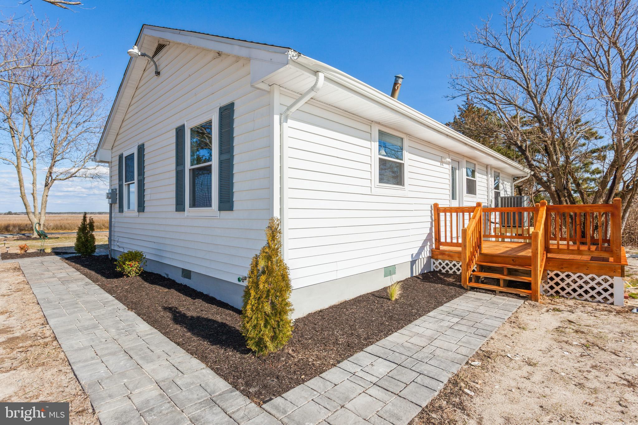 7744 Riverview Road Westover, MD 21871 - Photo 26 of 31 New Pavers go from front around to the back.